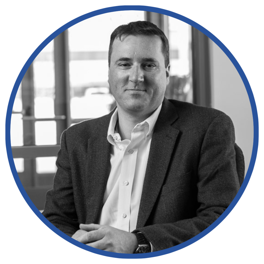 Black and white photograph of Chis Rice, the current CEO/President